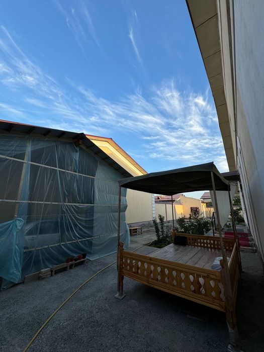 Урганч шахрида 600 м.кв намунали ховли жой сотилади.