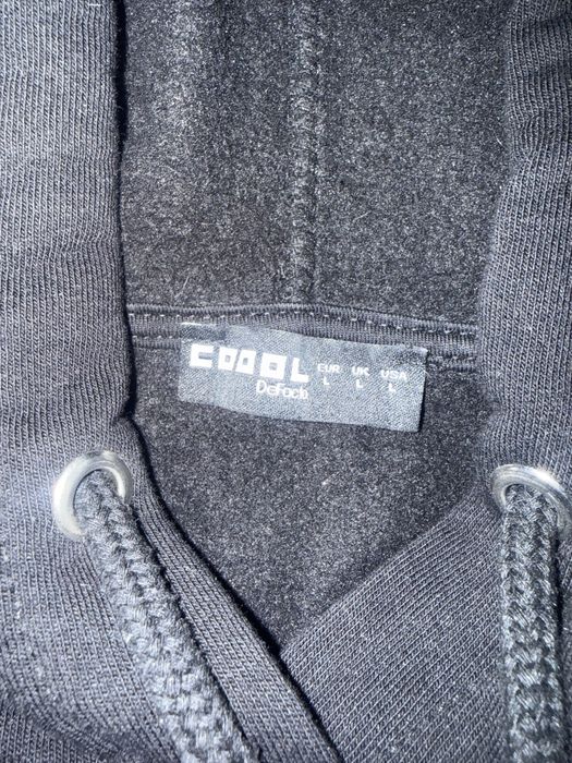 Худи дефакто укороченное