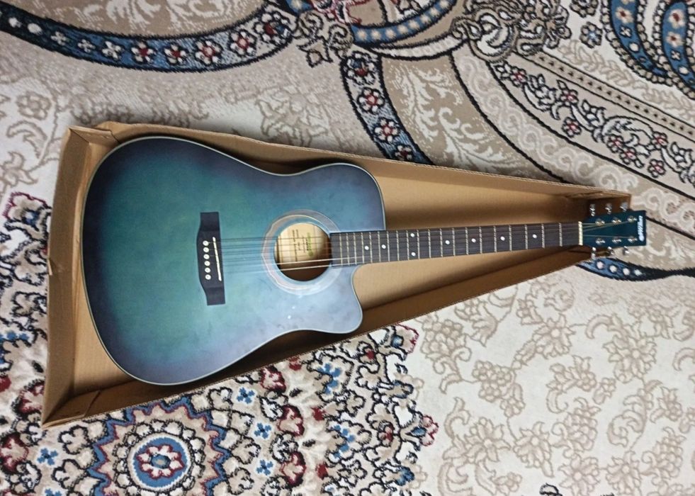 Gitara hali yangi