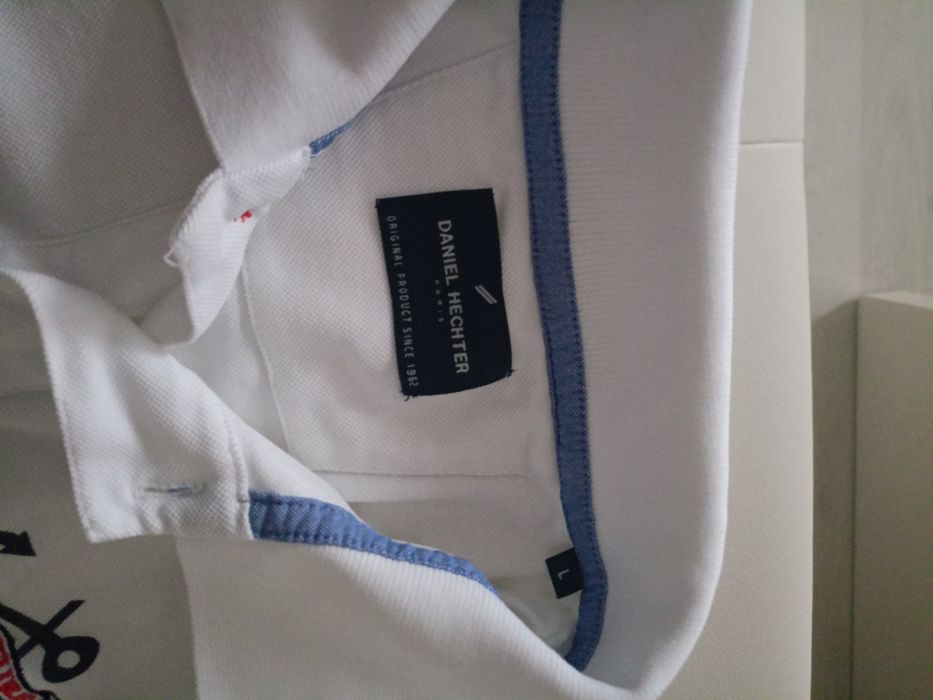 Vând tricou polo,calitate,in stare perfecta,produs original, daniel H.