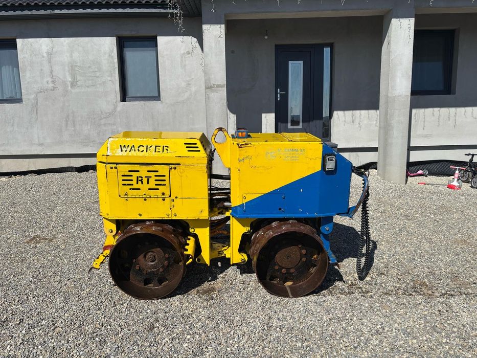 Bobcat de inchiriat Taiere beton gauri gard burghiu pamant sfredel