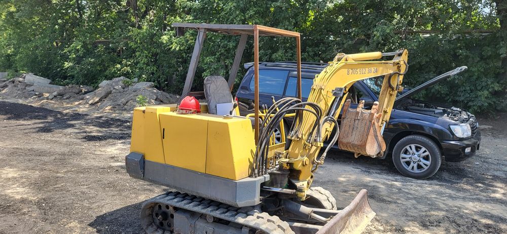 Мини зксковатор кубота япония