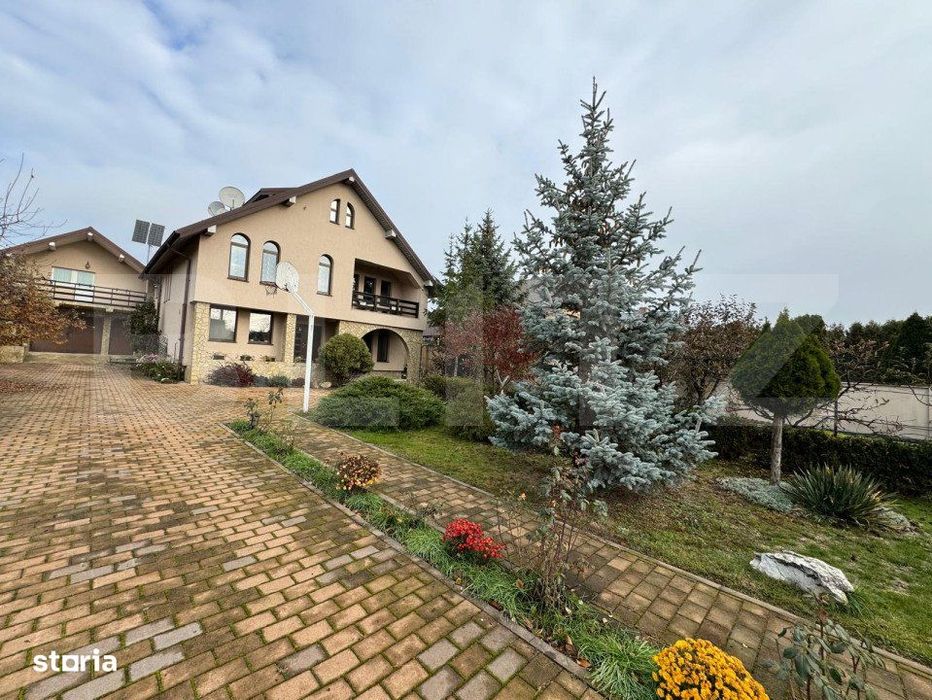 Casa impresionanta , 250 mp , cu gradina generoasa 1000 mp , Scheia