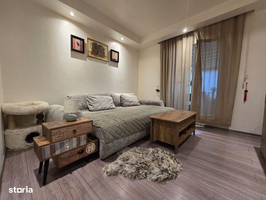 COSMOPOLIS - Apartament cu 2 camere si gradina, mobilat si utilat.