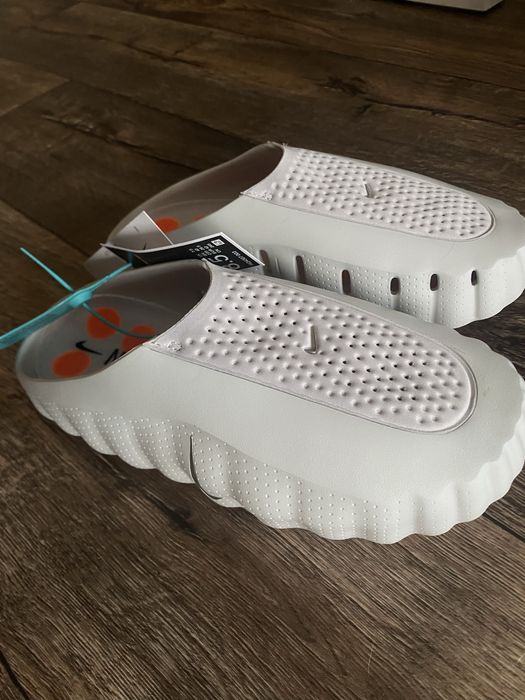 Продам новые шлепки Nike Mind 001