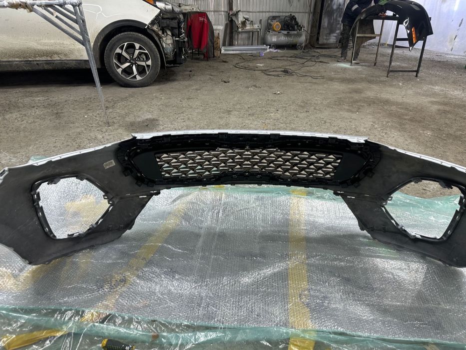 Передний бампер