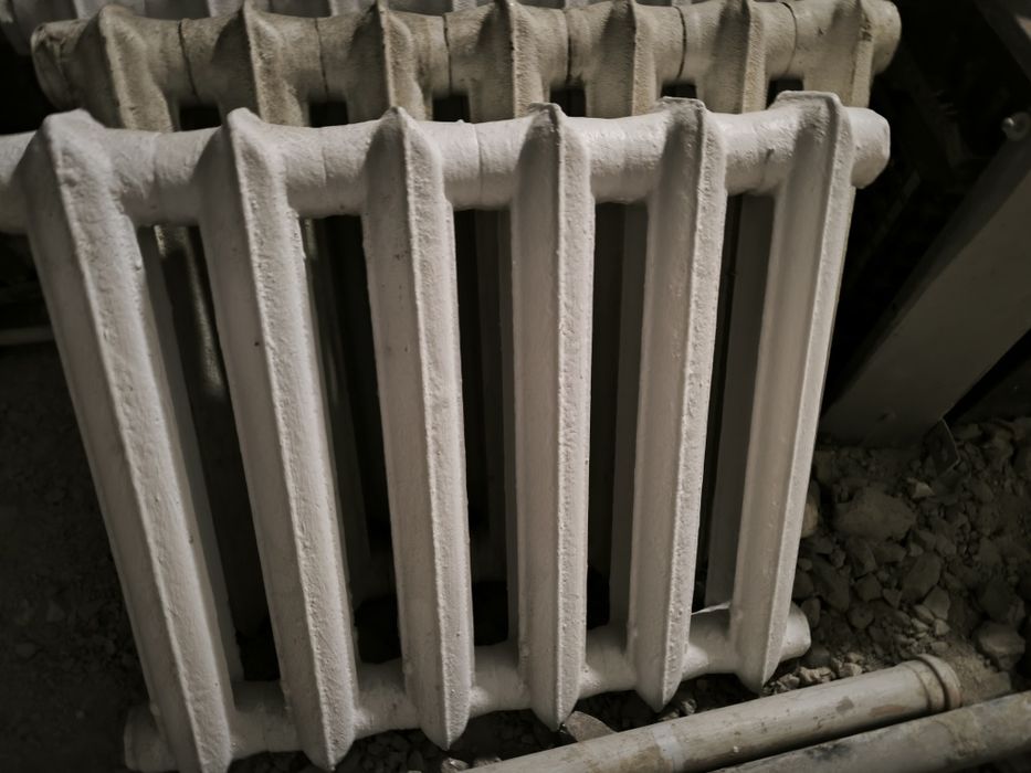 Продам батареи  чугунные