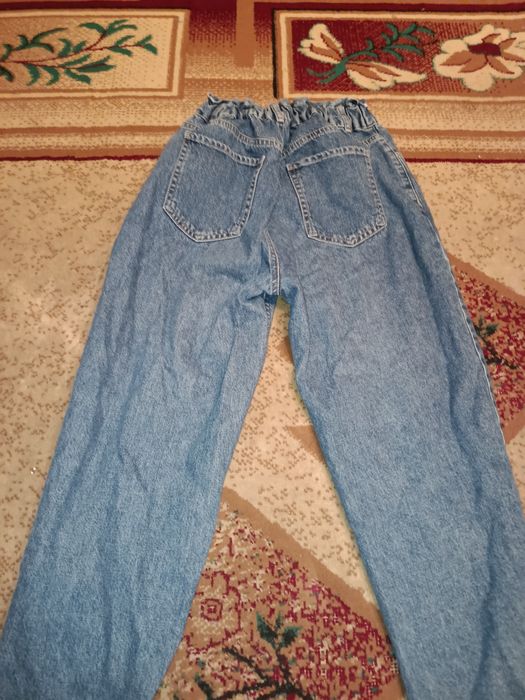 джинсы "бананы" синего цвета