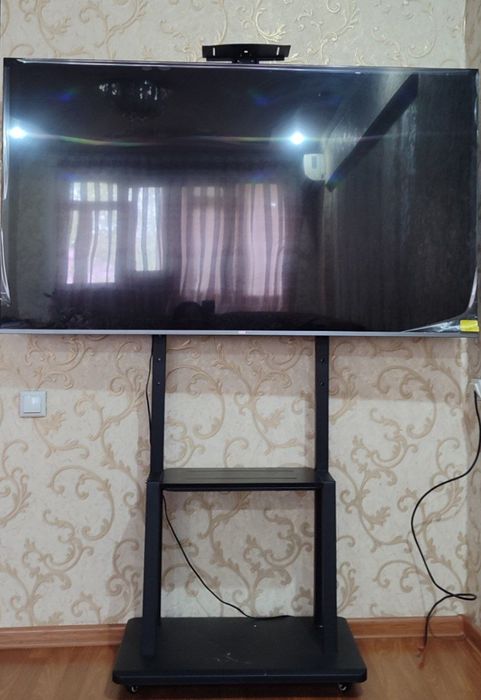 Artel 65 Smart Televizor podstavkasi bilan  deyarli yangi