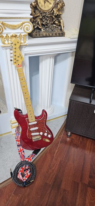 Электрогитара фирмы Fender.