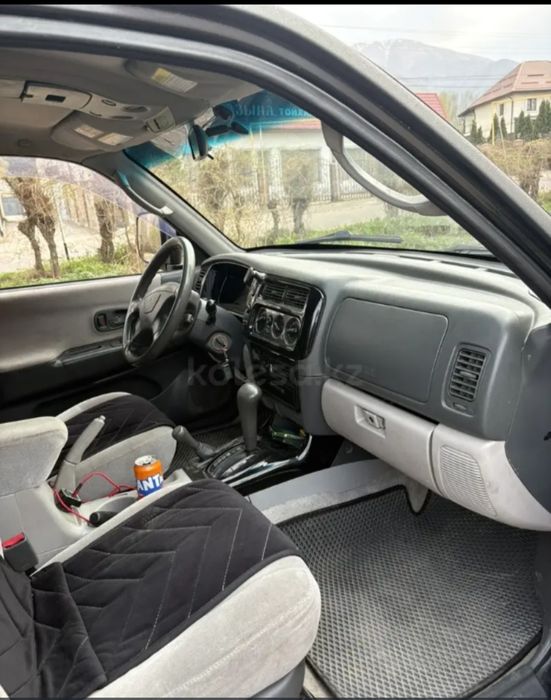 Митсубиси Монтеро Спорт.