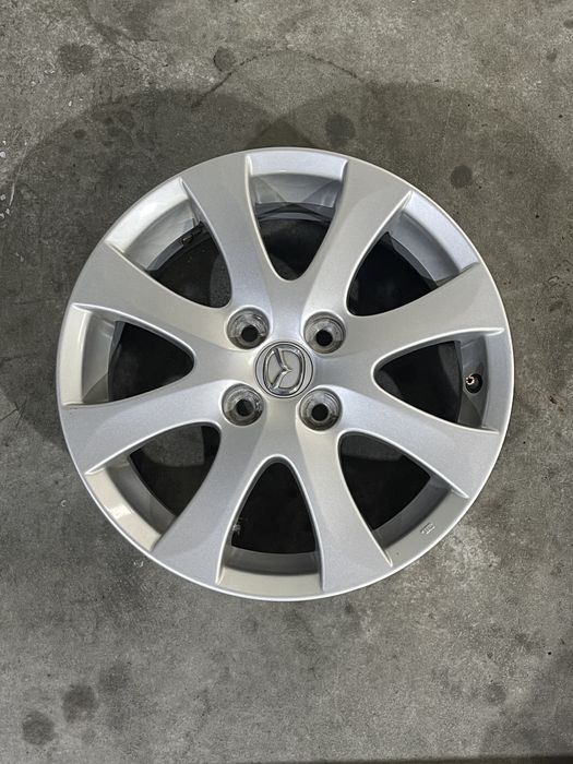Set 4 jante aliaj 15  4x100 Originale Mazada Demio