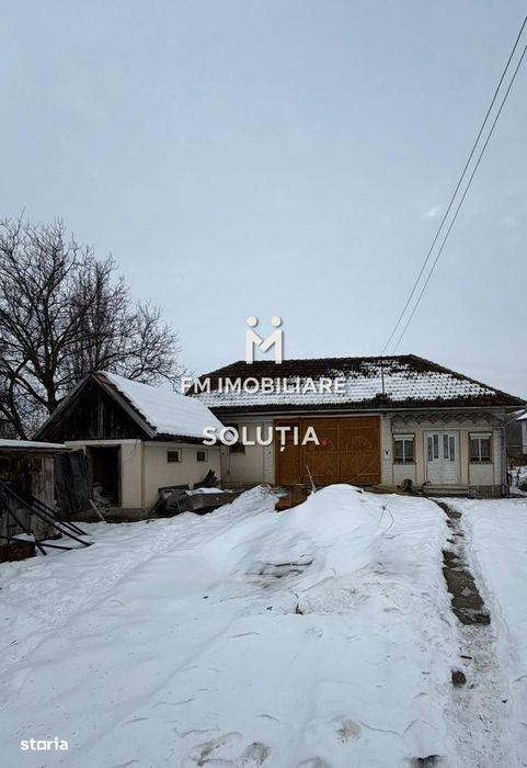 Casă cu teren generos în Buciumi