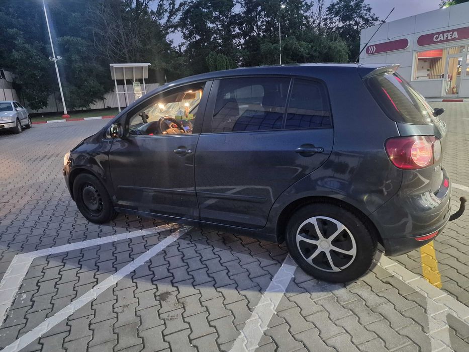 Wv golf 5 plus 1.4 benzina, clima 2 zone, scaune incalzite