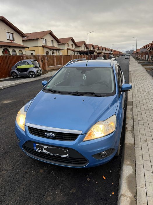 Ford Focus Break 2010 • 1.6 benzină 101CP  • Cârlig • 2 seturi roți