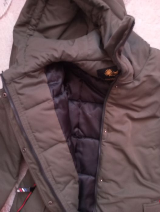 Продам зимний пуховик