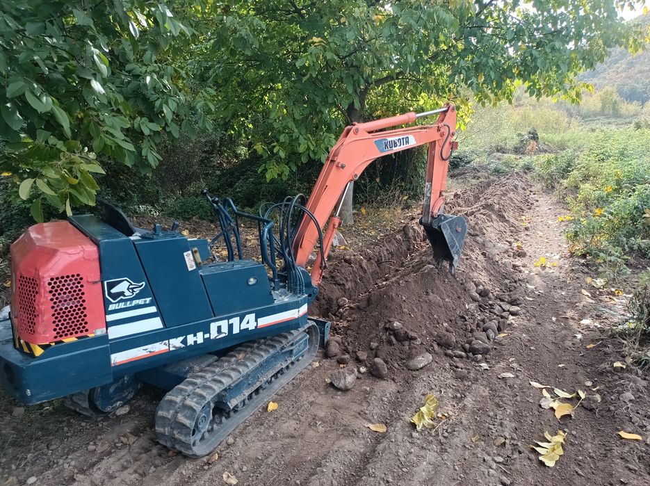 Багер Kubota KH014