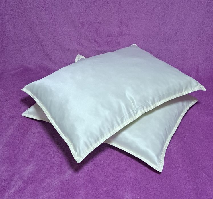 Подушки новые продам