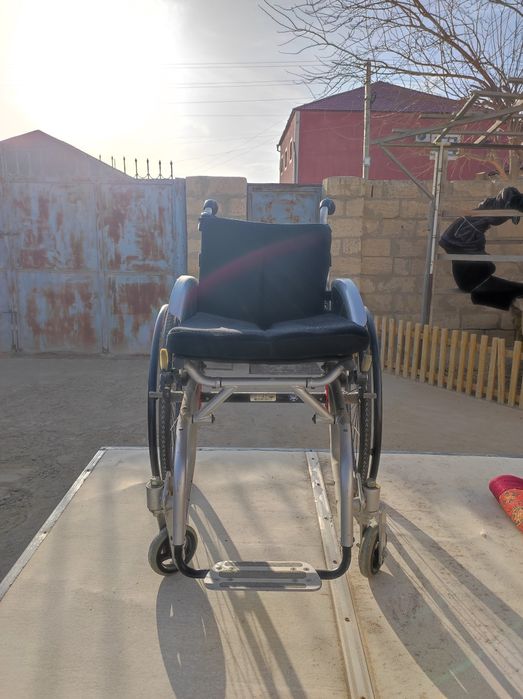 Инвалидная коляска