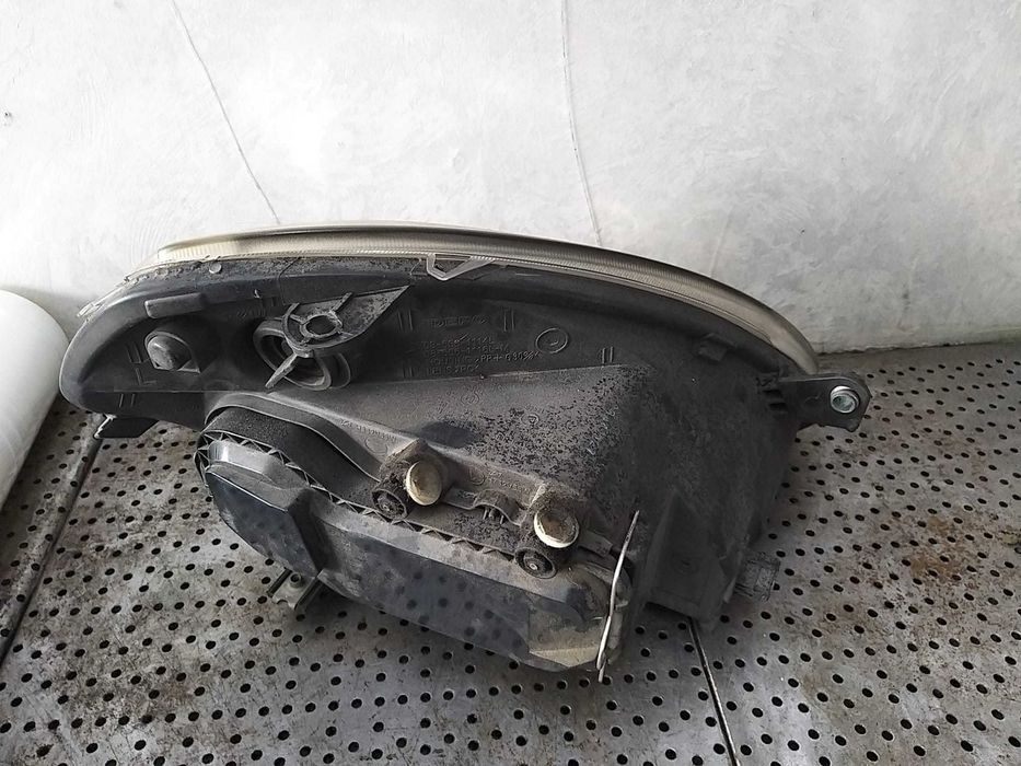 Far stanga lancia ypsilon 843 086661114l