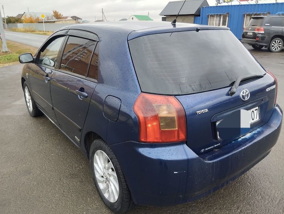 Тойота  Королла  Е120