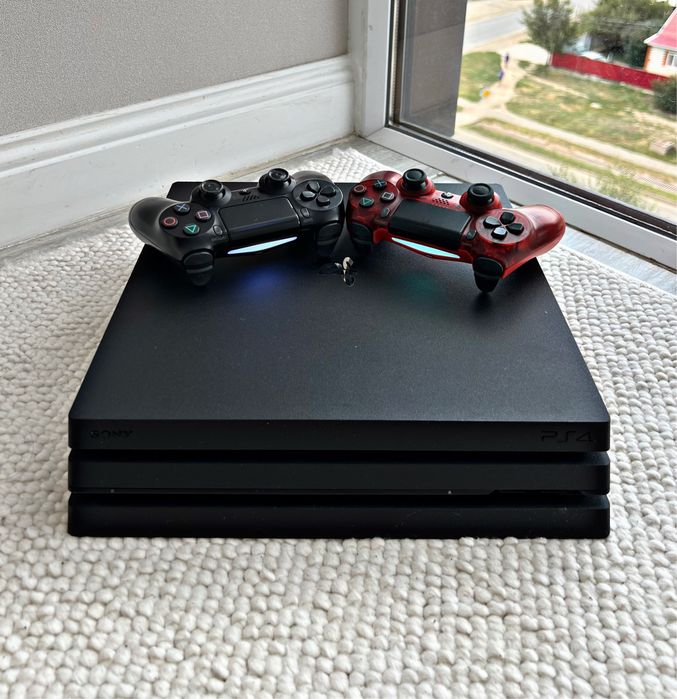 PlayStation 4 PRO 1 терабайт с играми