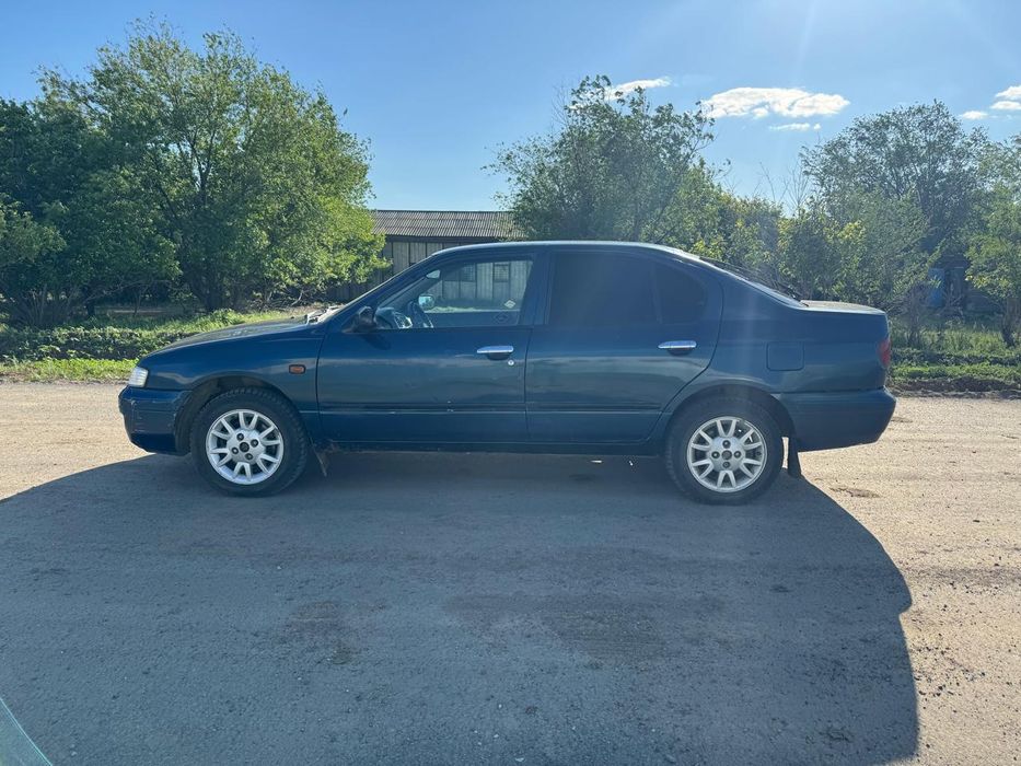 Ниссан примера п11