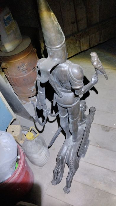 Залотой Человек статуэтка.