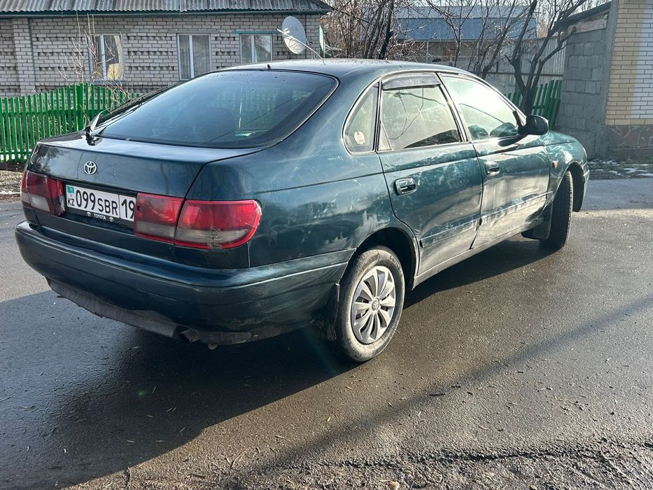 Тайота каринаа Е