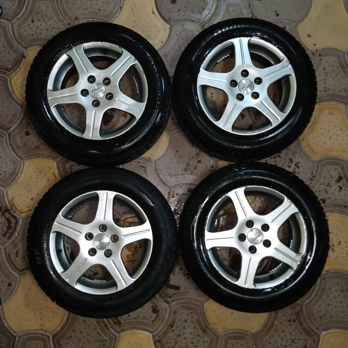 Anvelope (cauciucuri) iarnă cu jante 65/70 R14 folosite Goodrich