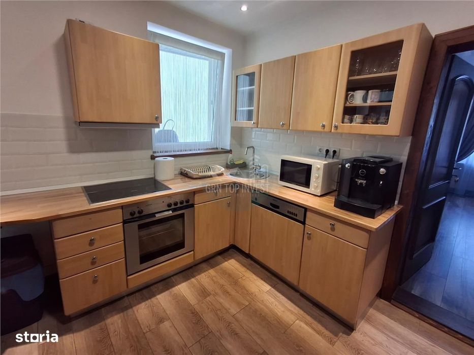 Casa individuala 4 camere 4 bai 250mp curte zona Piata Cluj