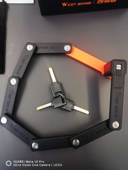 Заключващ механизъм за велосипеди, тротинетки и скутери