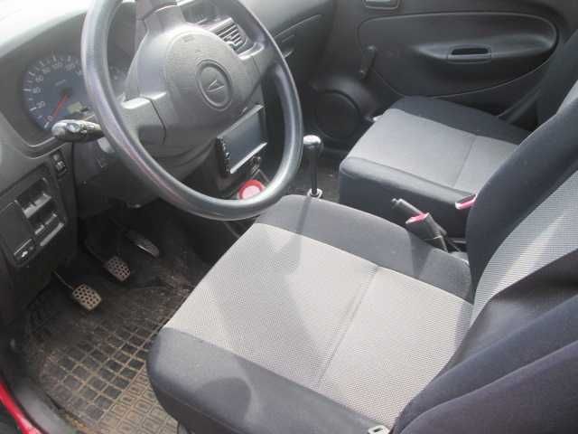 Daihatsu Cuore 2005,benzină