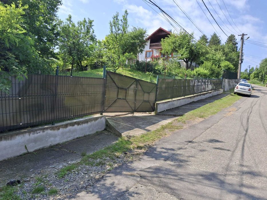 Casa 5 camere, util 122 mp, beci, garaj. 1.200 mp intravilan cu livada