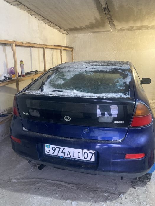 Мазда 323 кз учет