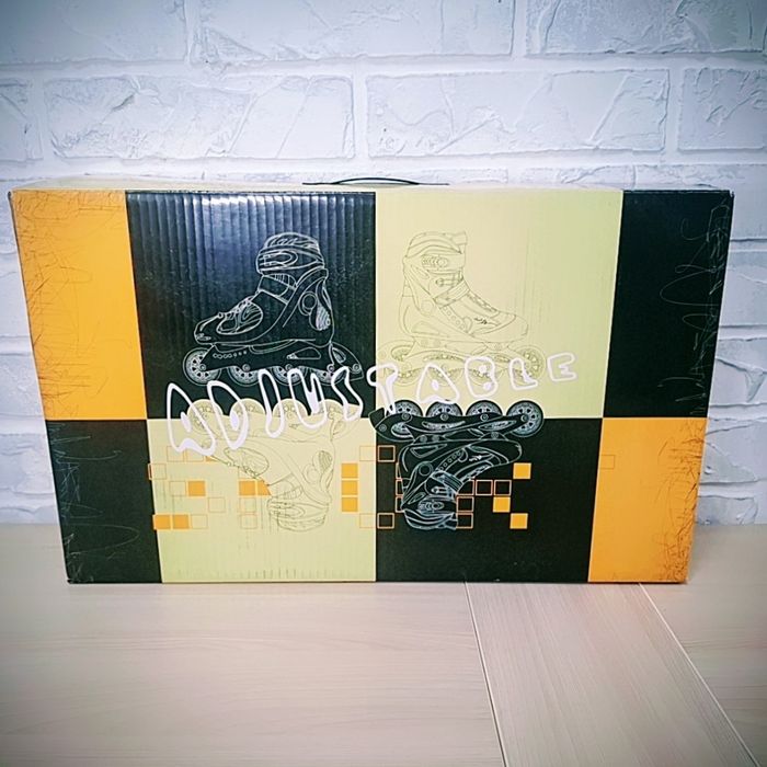 Роликовые коньки