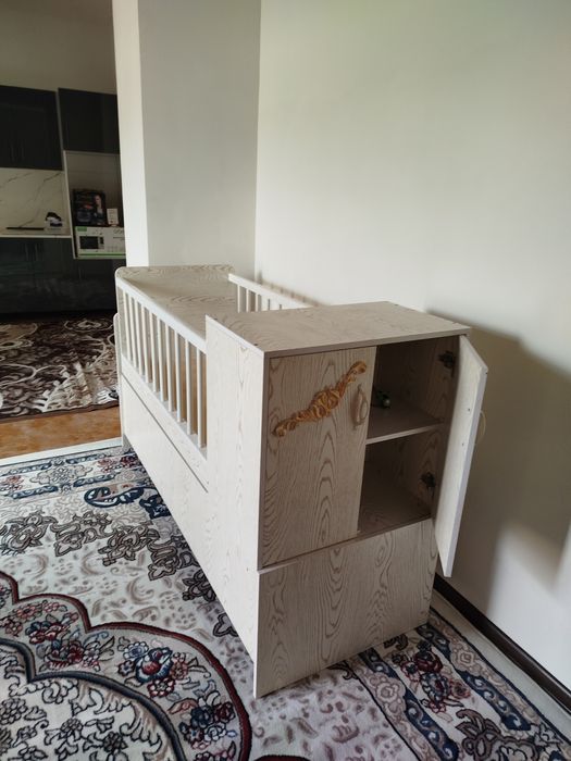 Bolalar tebratuvchi devani zamonaviy beshik