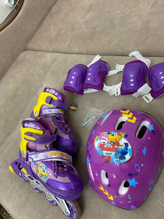 Роликовые коньки