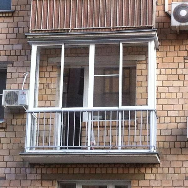 Пластиковые балконы окна двери