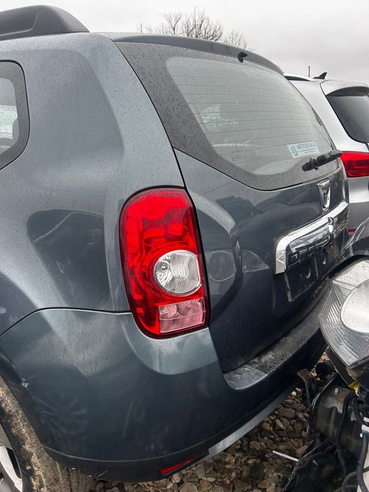 Aripă stânga spate Dacia Duster 2013