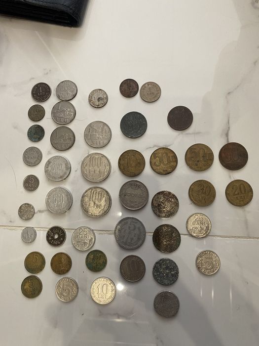 Vand monezi vechi romanesti si din toata lumea
