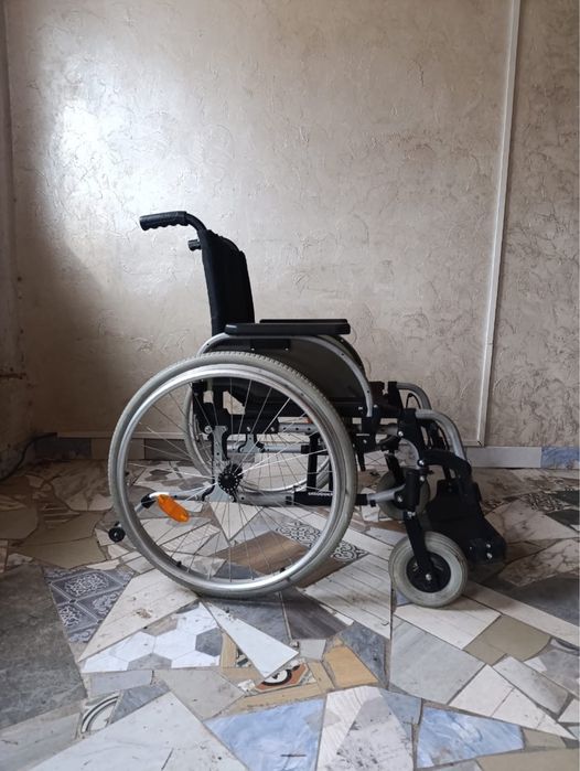 Инвалидная коляска