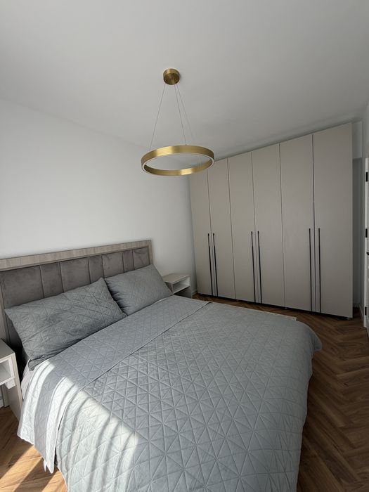 Apartament 2 camere, prima închiriere, parcare privată, complet mobilat și utilat – 450€/lună