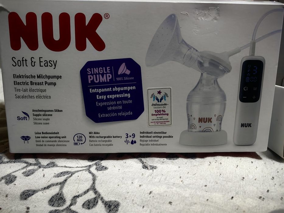 Електрическа помпа за кърма NUK и преносим нагревател за топлене мляко