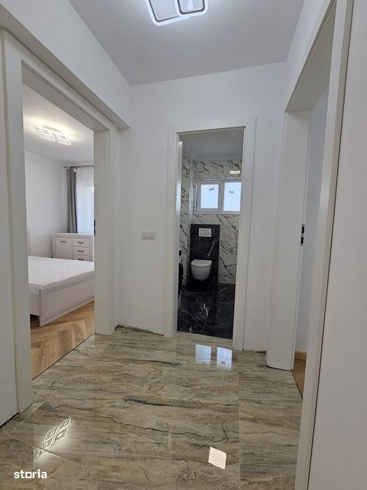 2 dormitoare separate plus 1 living cu bucătărie - Bloc nou - Etaj 3/4 — fotografia 3
