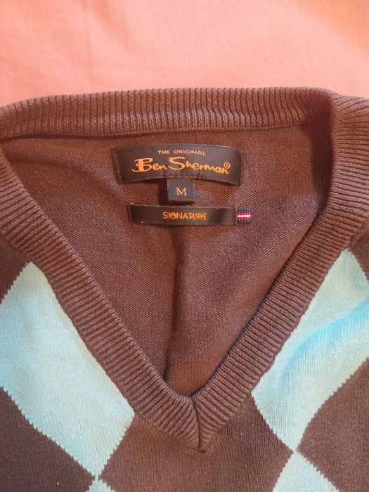 Пуловери от добри марки.