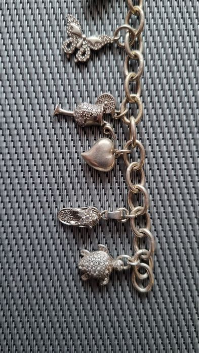 Сребърна гривна с сребърни талисмани