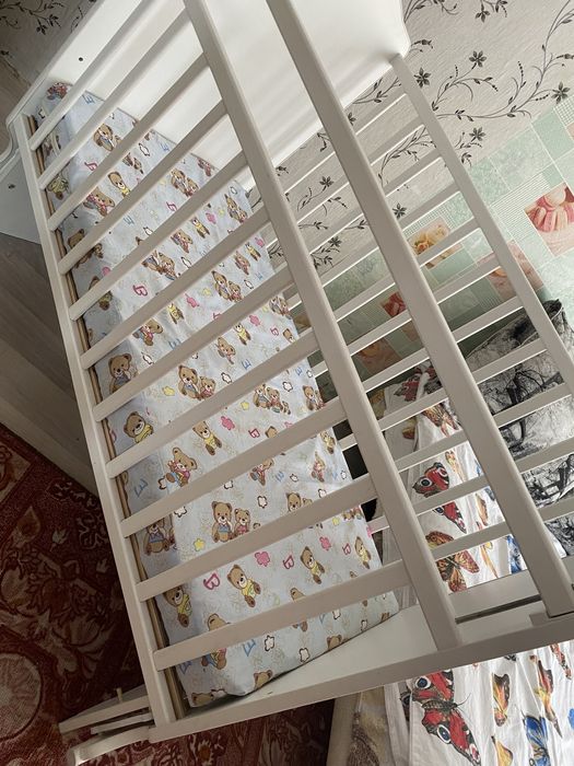 Детская кроватка маятник