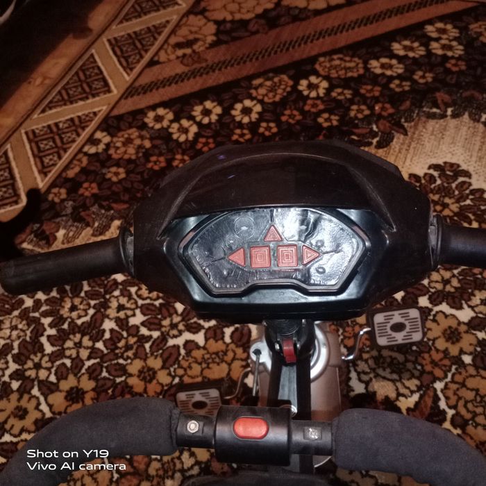 Детский велосипед с управлением