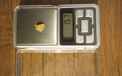 Златна монета ангел хранител